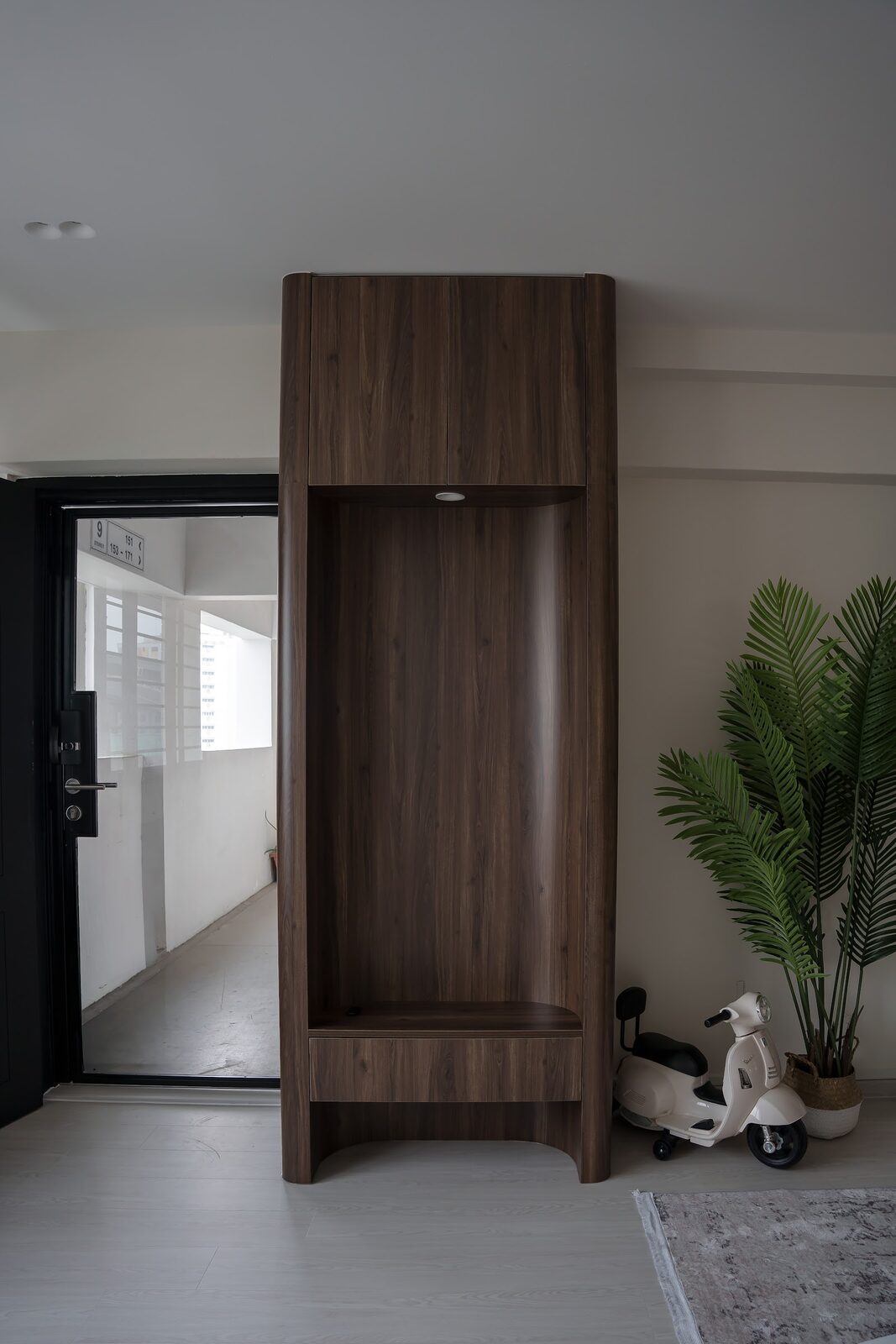 Entry shoe tower with bench, 750 Jurong West St 73 by Aura Design & Co.